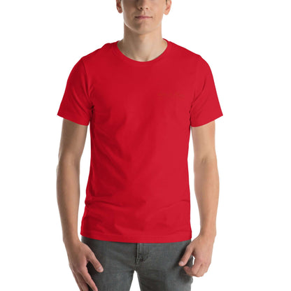 Model wearing a Red 'Less is More' embroidered t-shirt, facing forward.