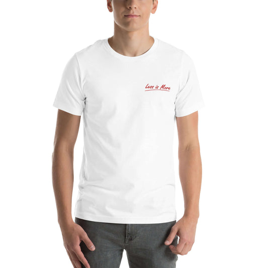Model wearing a white 'Less is More' embroidered t-shirt, facing forward.